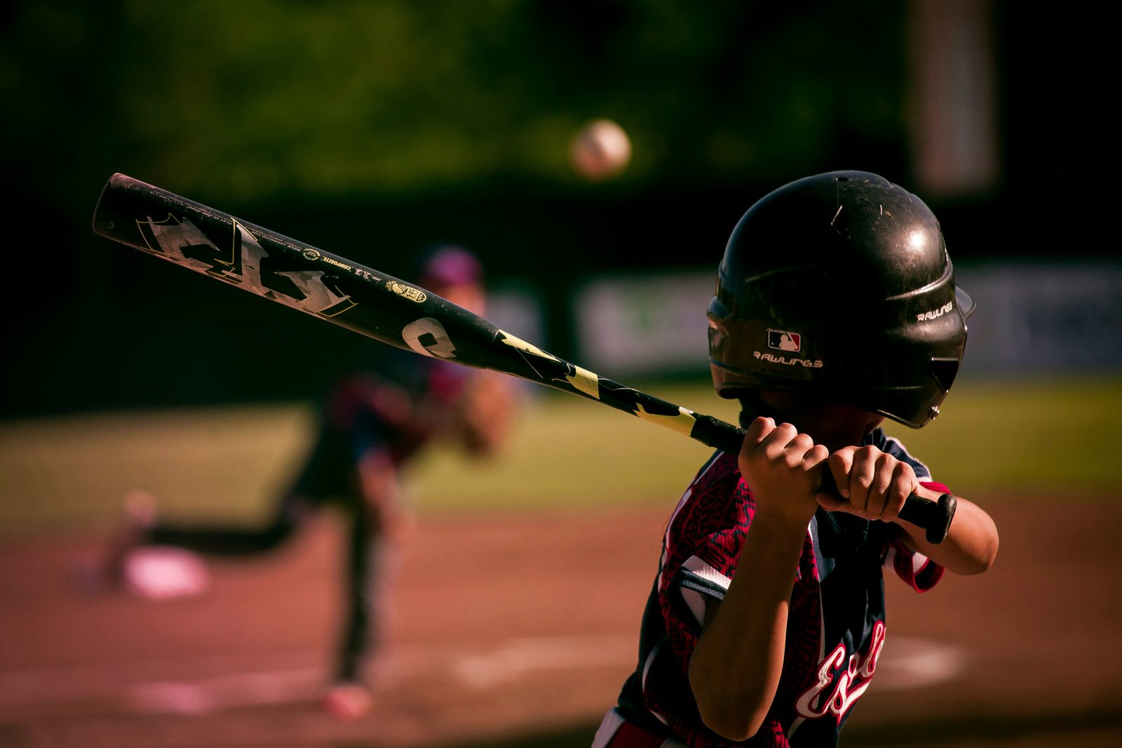 A youth baseball player at bat